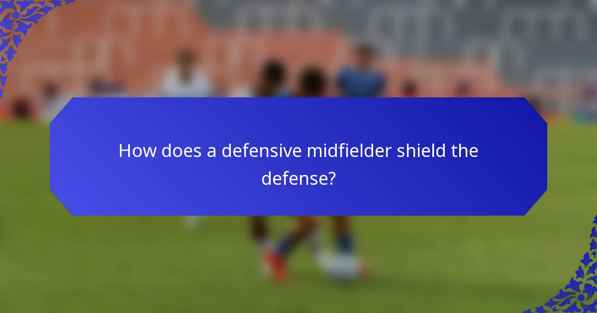 How does a defensive midfielder shield the defense?